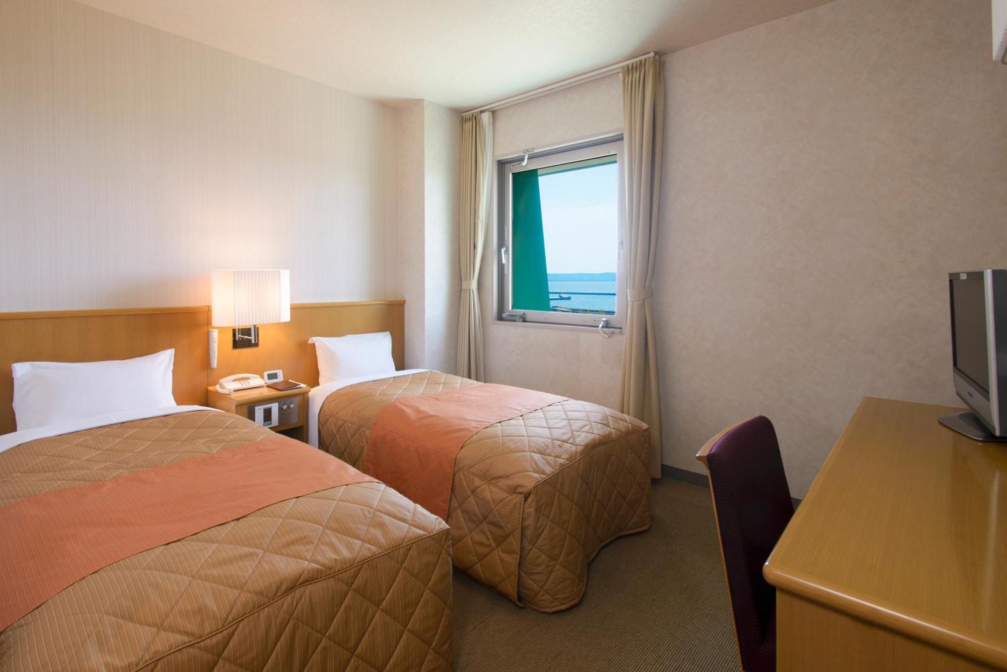 Hotel Folkloro Ominato Mutsu Quarto foto